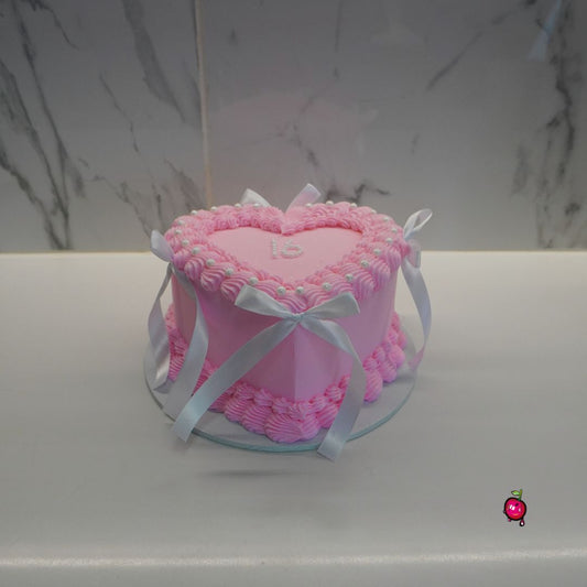 Sweet 16 In Pearls, Pink and White Heart Cake with Ribbons