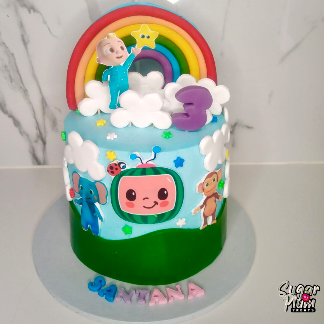 Cocomelon with a Rainbow Birthday Cake