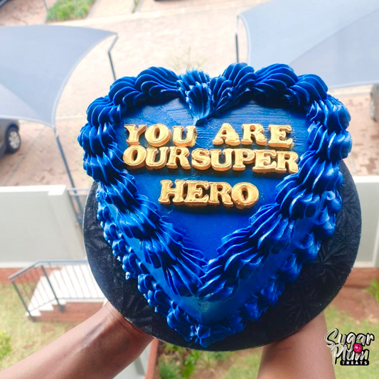 “You are our superhero ” Heart Cake