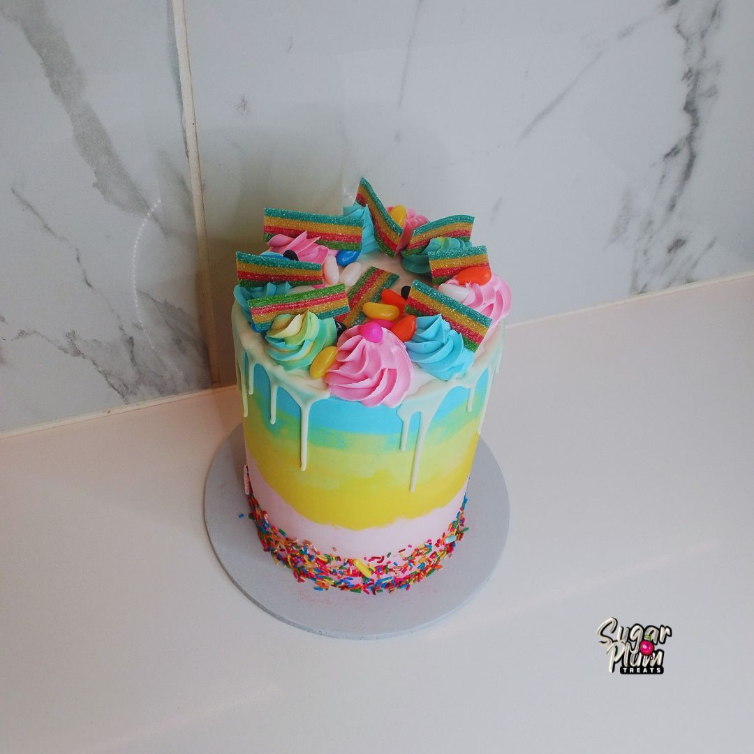 Rainbow Themed Drip Cake with Sweets