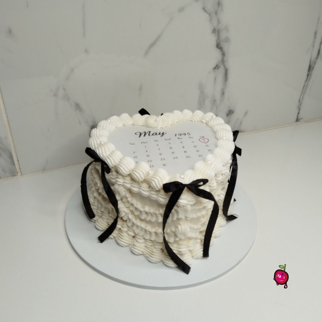 White & Black Vintage Burn-Away Heart Cake with Black Ribbons