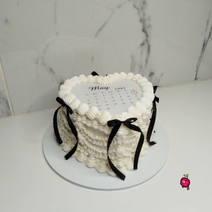 White & Black Vintage Burn-Away Heart Cake with Black Ribbons
