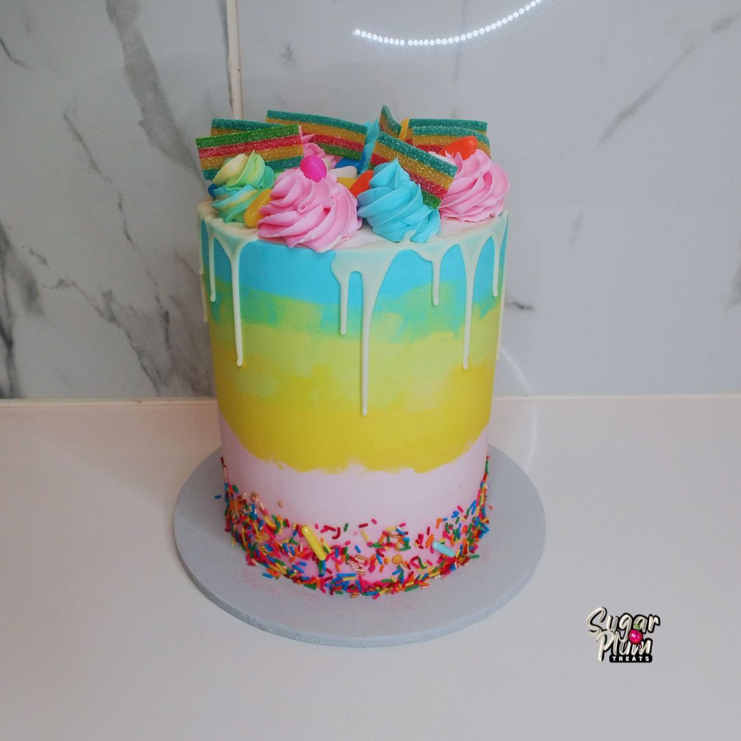 Rainbow Themed Drip Cake with Sweets