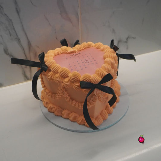 Vintage Peach Calendar Burn-away Heart Cake with Black Ribbons