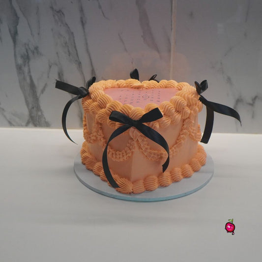 Vintage Peach Calendar Burn-away Heart Cake with Black Ribbons