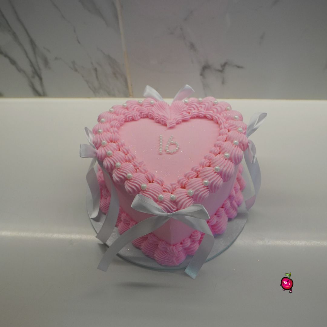 Sweet 16 In Pearls, Pink and White Heart Cake with Ribbons