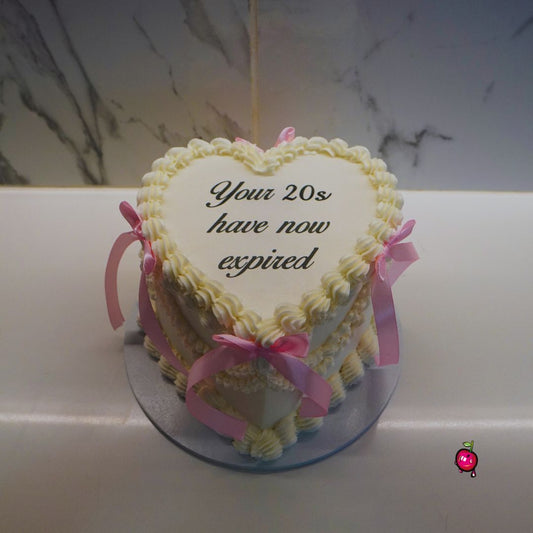 Your 20's Have now Expired Burn-away Heart Cake with Ribbons.