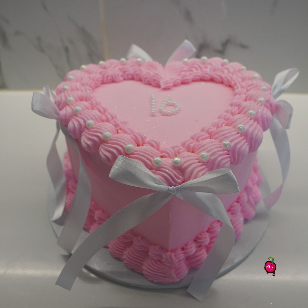 Sweet 16 In Pearls, Pink and White Heart Cake with Ribbons