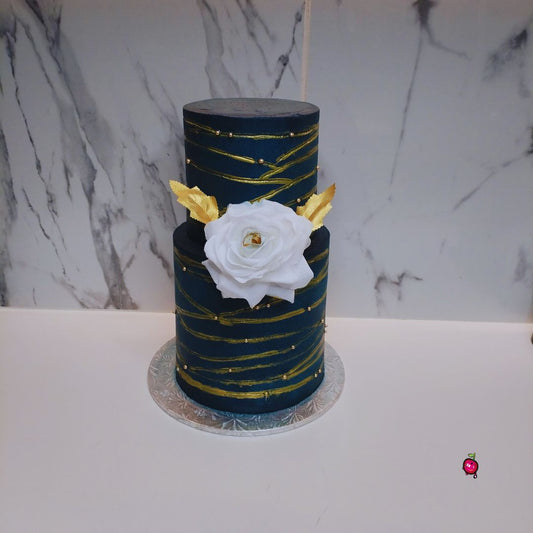 2 Tier Navy and Gold Cake with a big white rose