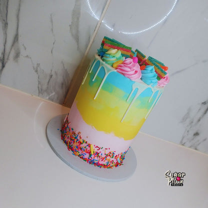 Rainbow Themed Drip Cake with Sweets