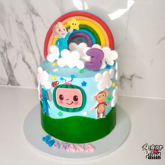 Cocomelon with a Rainbow Birthday Cake