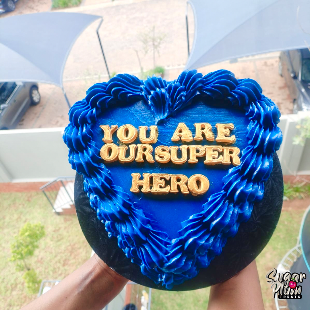 “You are our superhero ” Heart Cake