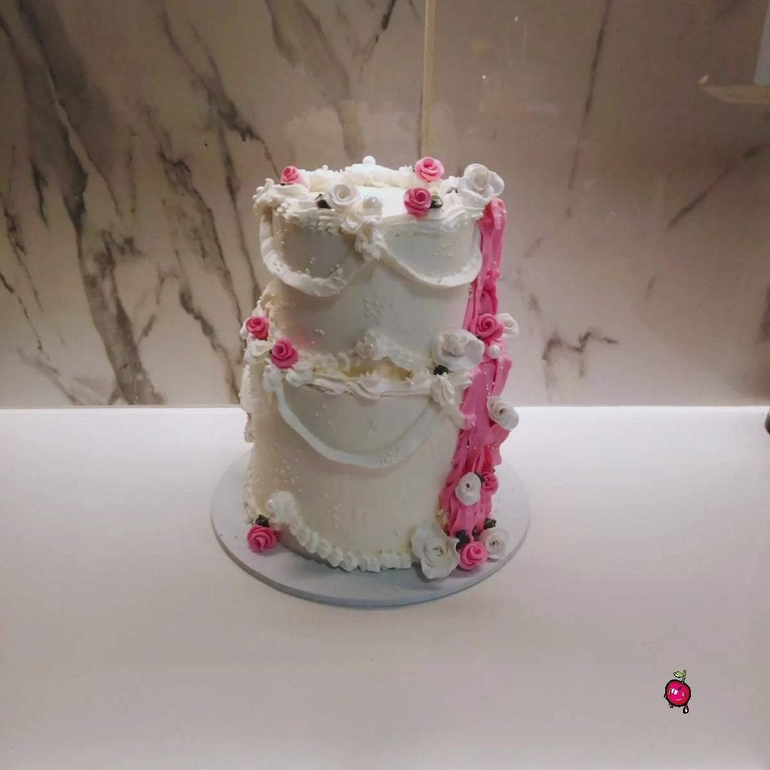 2 Tier Pink and White Cake with Roses