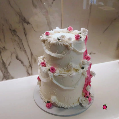 2 Tier Pink and White Cake with Roses